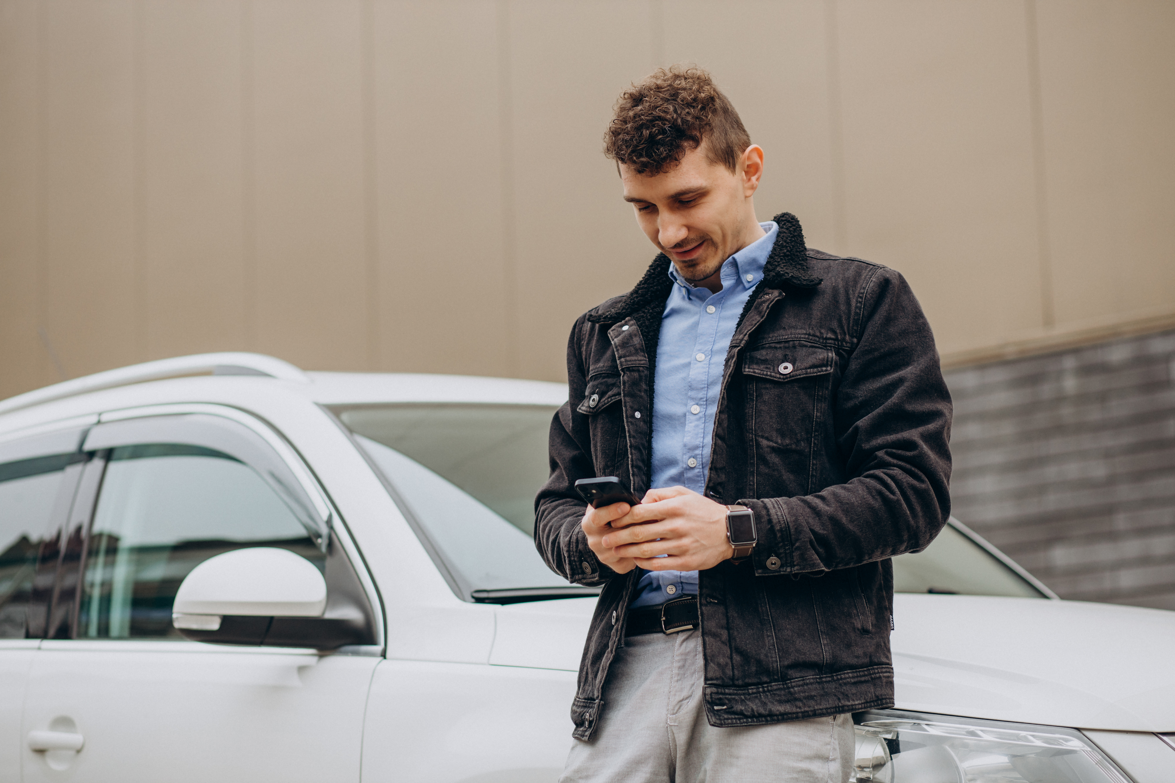 Gig driver checking his phone